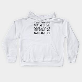 It's Not Easy Being My Wife's Arm Candy But Here I Am Nailing it Funny Idea Kids Hoodie